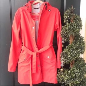 Helly Hansen Rain Coat Size medium in coral color with striped lining
